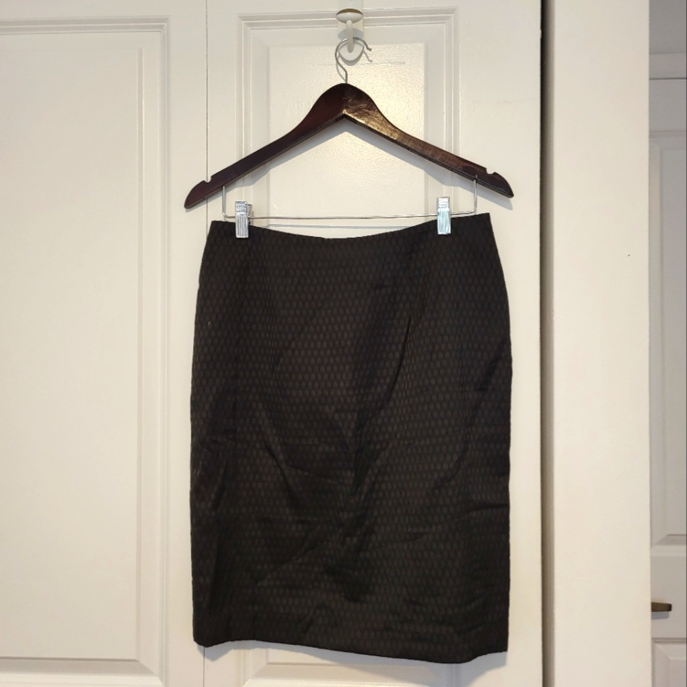 Size 8, knee-length black pencil skirt, by Mario Serrani
